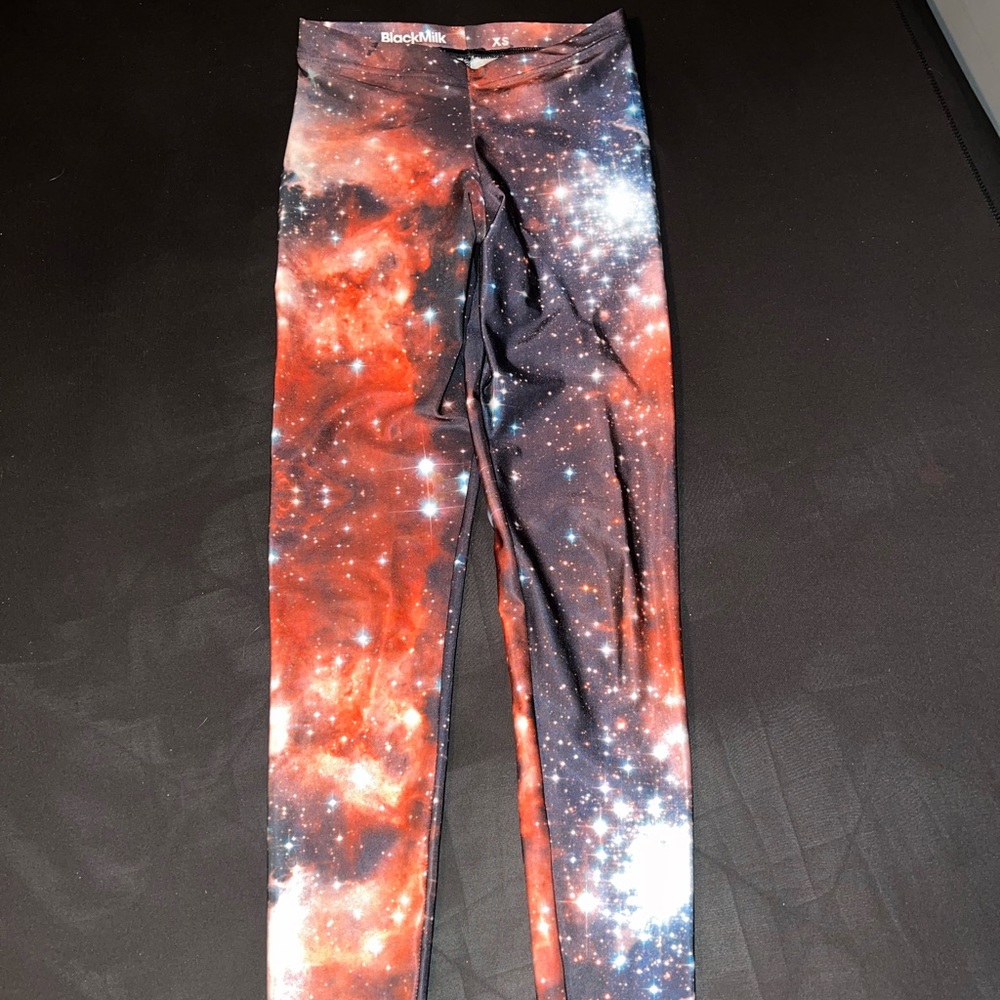 XS Red Galaxy leggings by Blackmilk Clothing